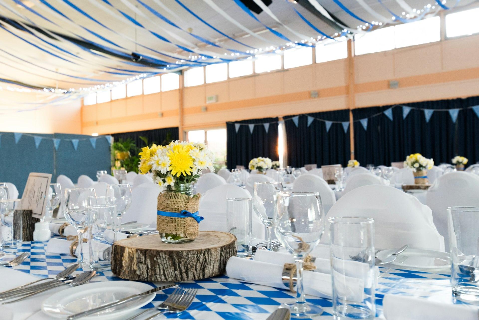 Placeholder: outdoor celebration with string lights and long tables